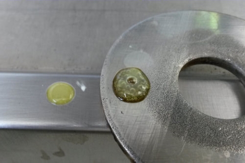 Results of the Avesta Moly Drop Test on a strip of 304 (left) and on a 316 washer (right)